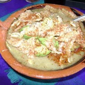 White Chicken Pozole with pork rinds, avocado, chile