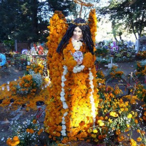 Angel made of marigolds amogst the ofrendas. Patzcuaro, Michoacan